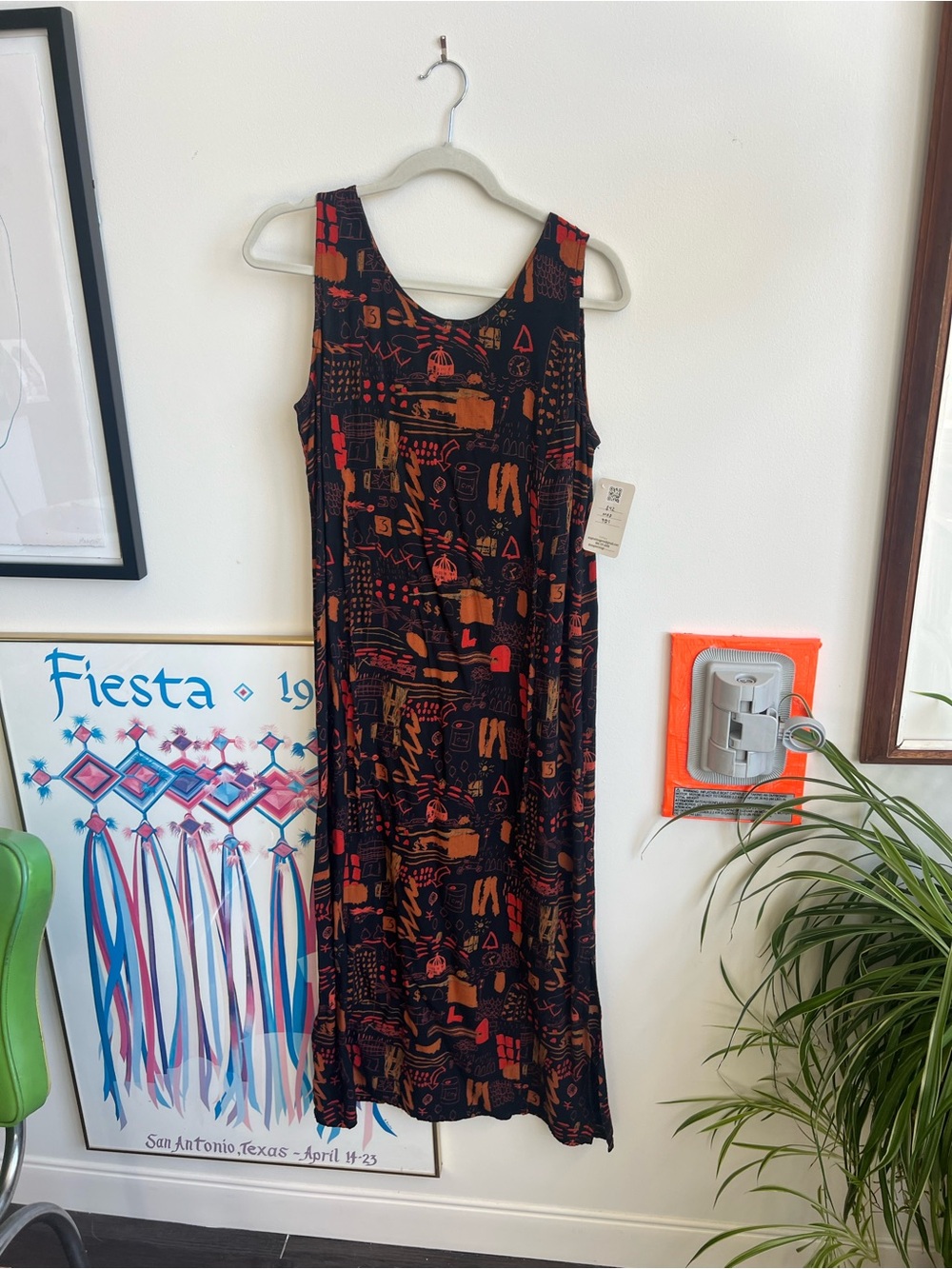 Sleeveless Black Dress with Orange Graphic Print